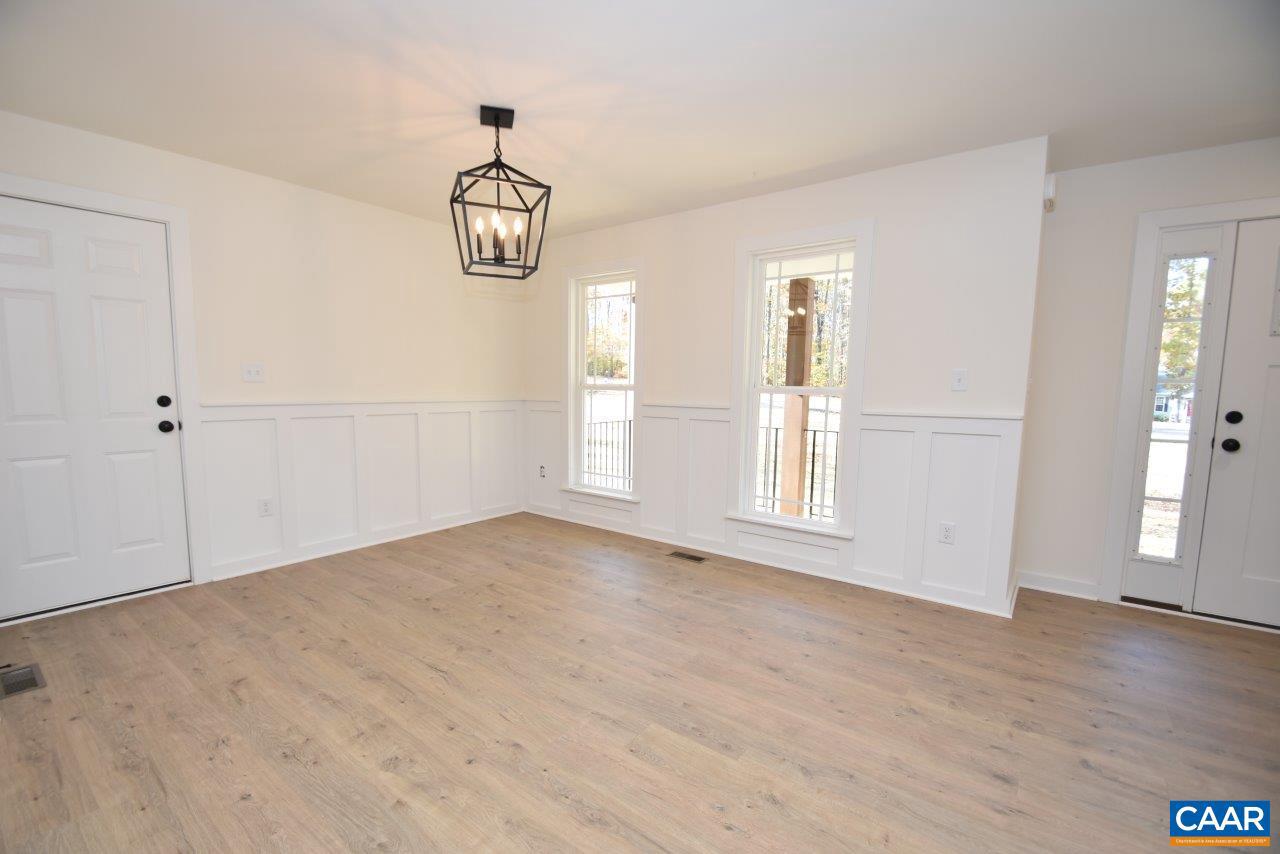 5 Bacon Bit Lane Louisa, VA 23093 - Photo 5 of 27 a view of an empty room with wooden floor and windows