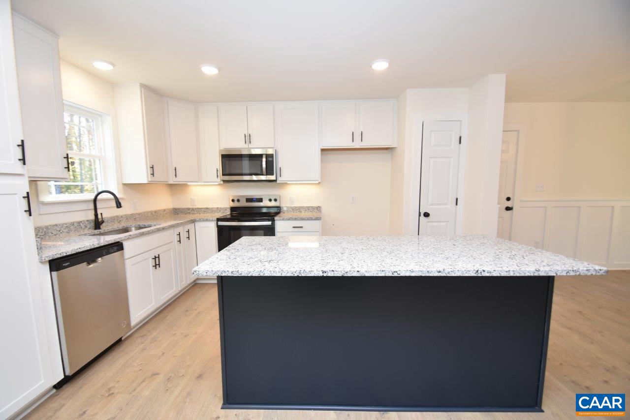 5 Bacon Bit Lane Louisa, VA 23093 - Photo 7 of 27 a kitchen with granite countertop a sink a counter top space stainless steel appliances and cabinets