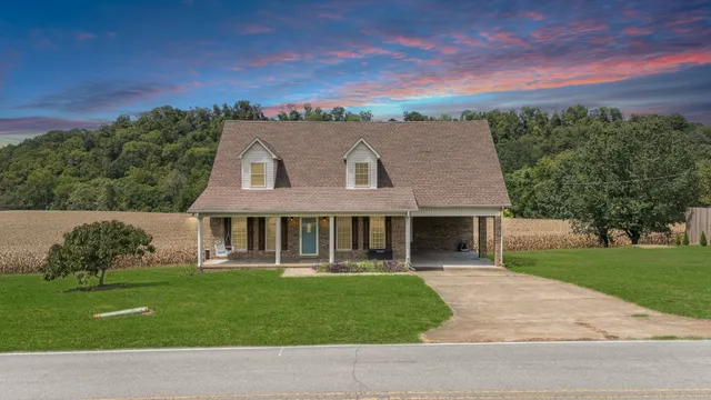 front view of a house with a yard