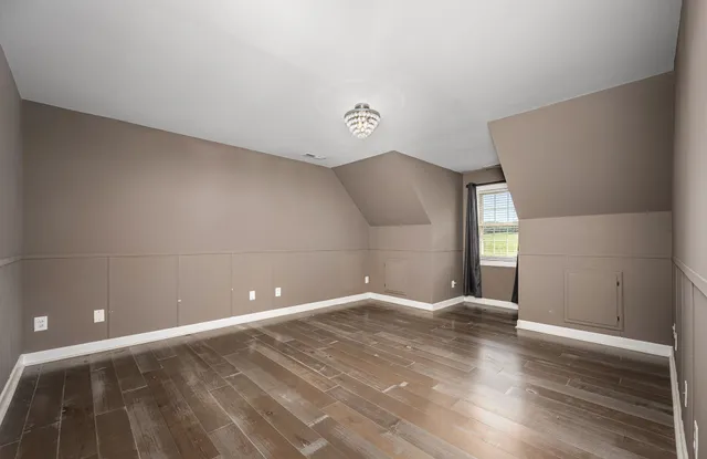 a view of a room with racks on the wall