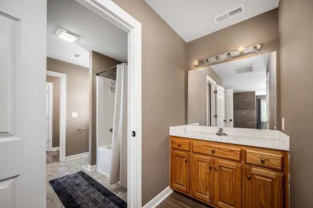 a balcony with view of an outdoor space