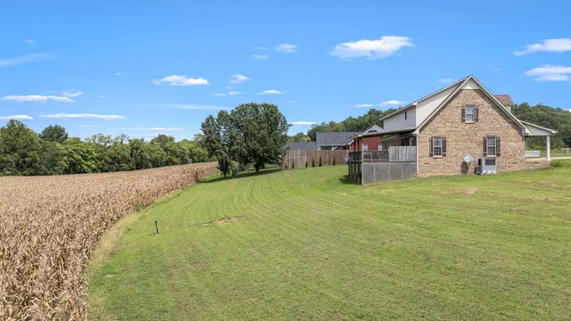 a kitchen with stainless steel appliances granite countertop a stove and a refrigerator