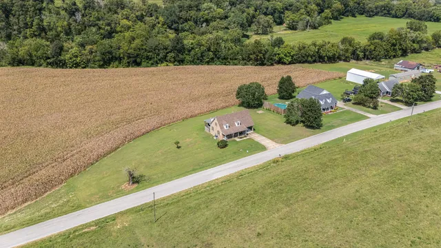 a kitchen with a stove a sink and a refrigerator