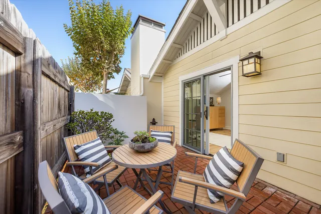 a view of a outdoor seating area with furniture