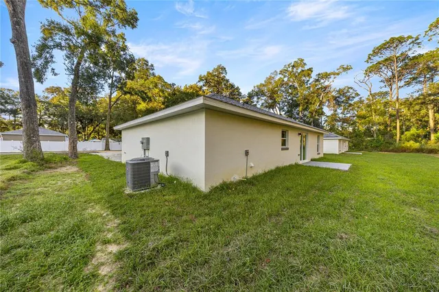 a house view with a garden space