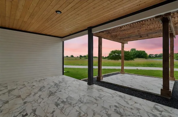 a view of a yard with porch