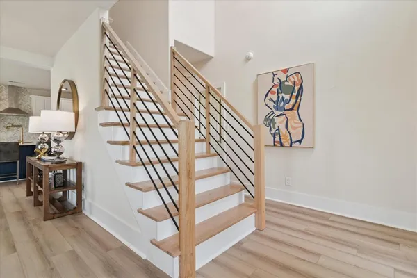 a view of entryway with wooden floor