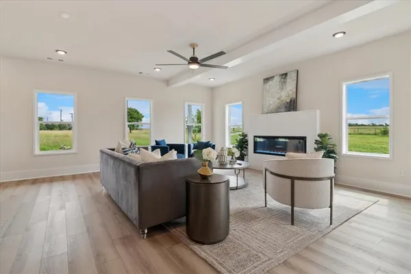 a living room with a couch and a window