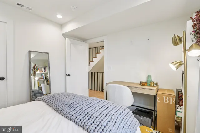 a bathroom with a sink a toilet and a bathtub