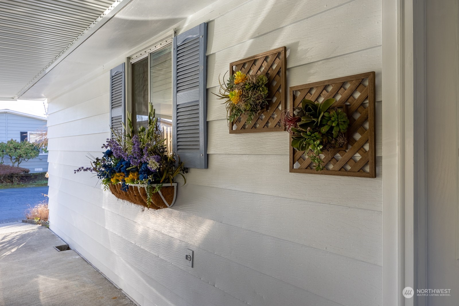 201 Union Avenue Southeast, Unit 131 Renton, WA 98059 - Photo 20 of 24 a view of a house with a potted plant