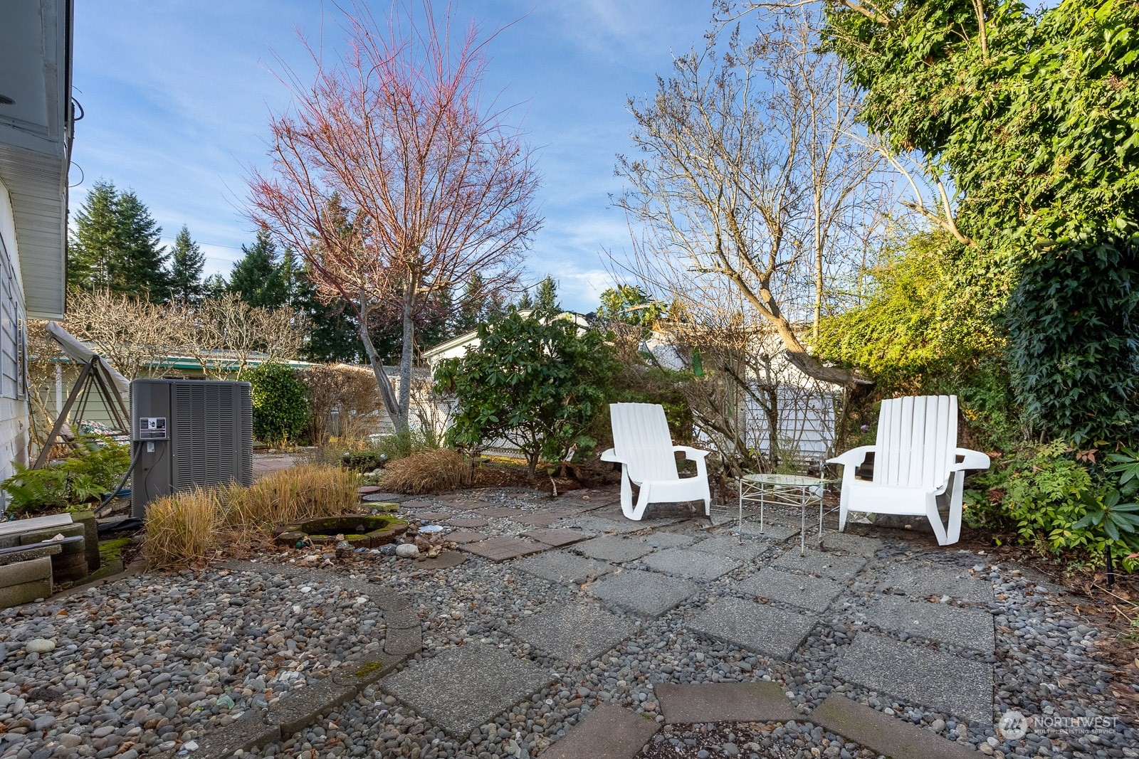 201 Union Avenue Southeast, Unit 131 Renton, WA 98059 - Photo 3 of 24 a view of backyard of house with outdoor seating and green space