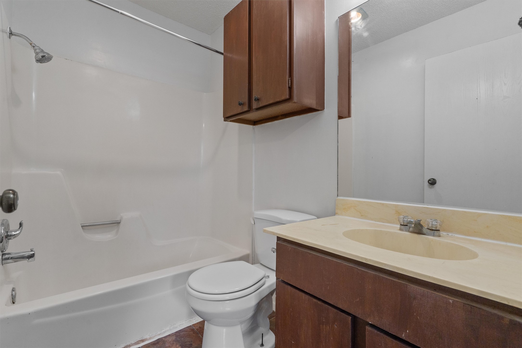 5304 Indio Circle, Unit B Austin, TX 78745 - Photo 16 of 27 a bathroom with a sink toilet and vanity