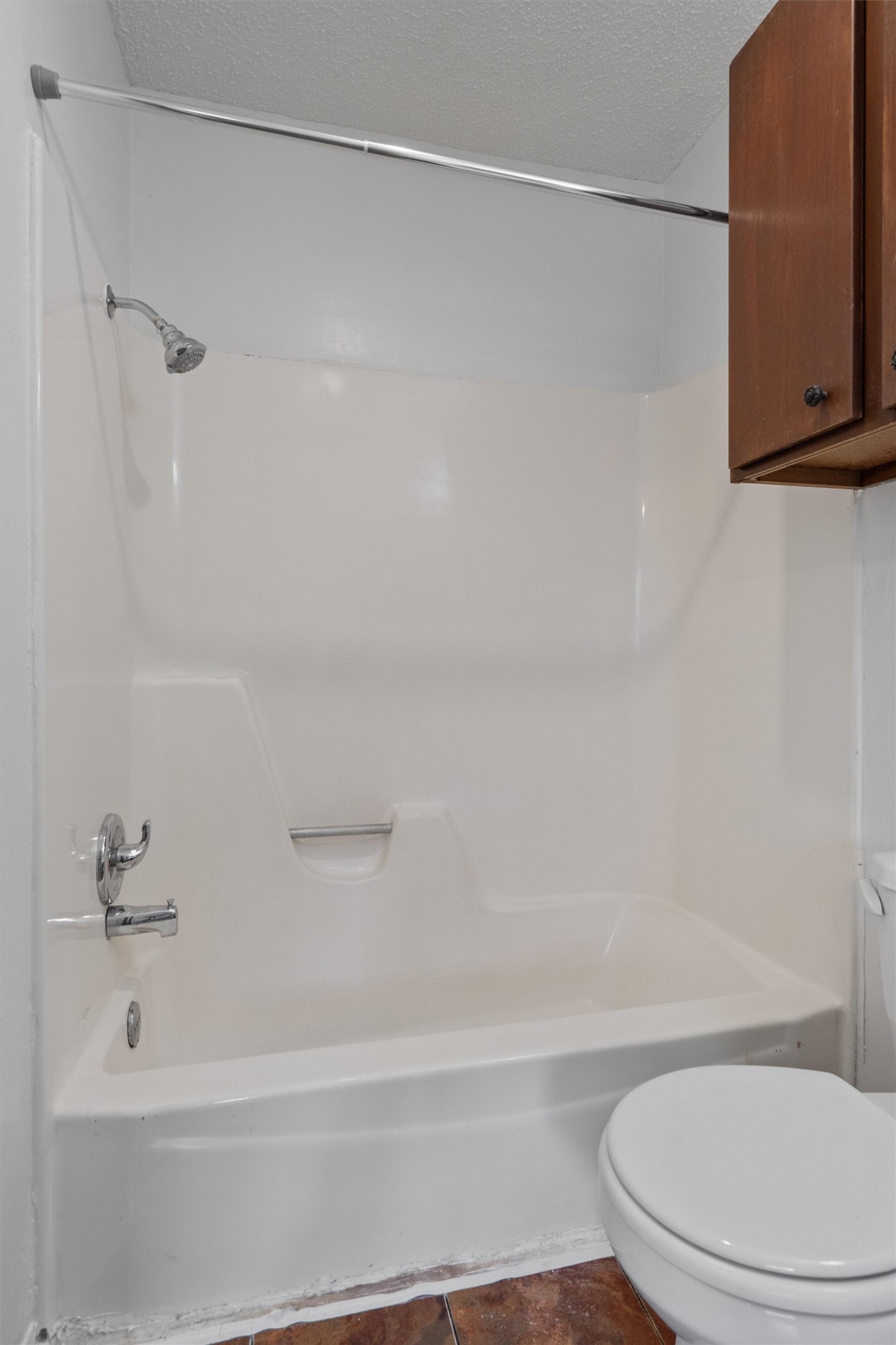 5304 Indio Circle, Unit B Austin, TX 78745 - Photo 17 of 27 a bathroom with a shower and a toilet