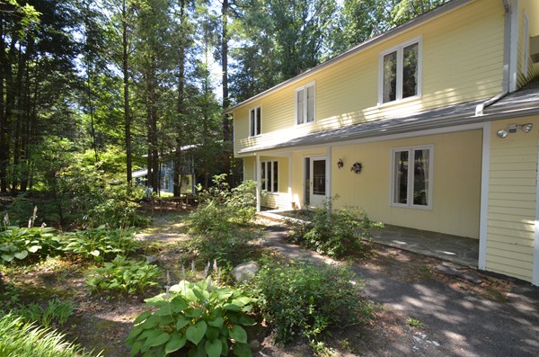 195 Heatherstone Road Amherst, MA 01002 - Photo 3 of 29 a view of a house with a yard