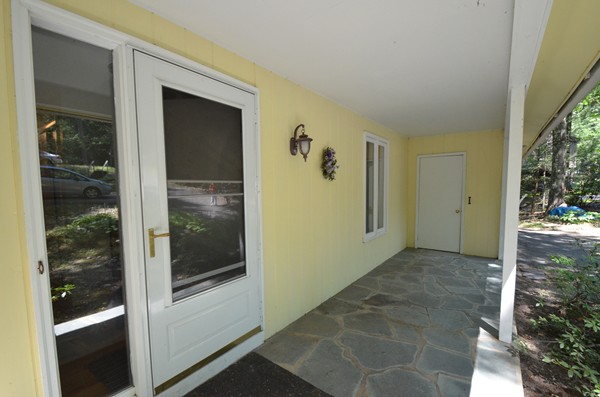 195 Heatherstone Road Amherst, MA 01002 - Photo 4 of 29 a view of a porch