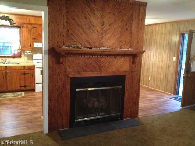 901 Garrison Road Reidsville, NC 27320 - Photo 9 of 15 Living Room. Gas log fireplace