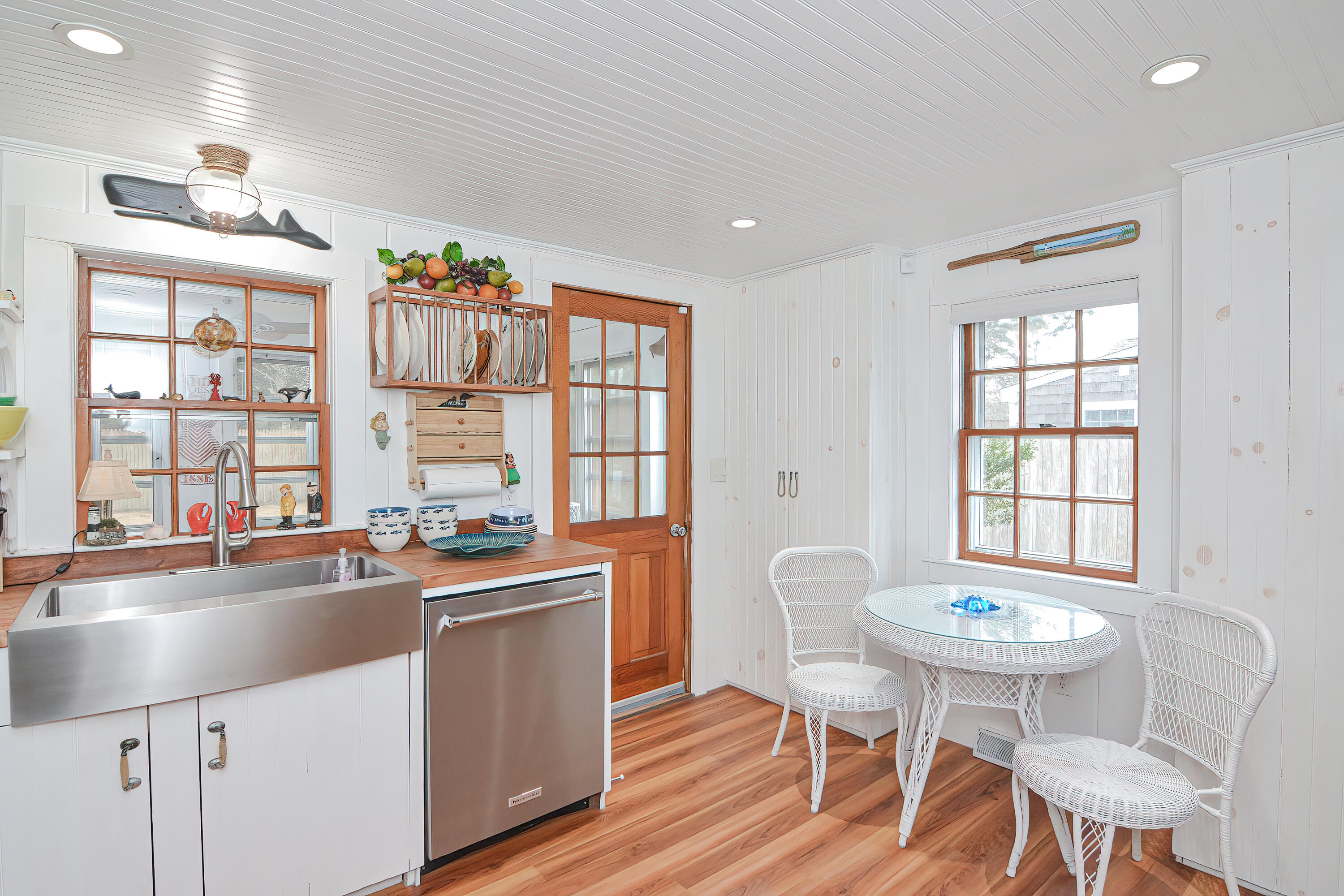 31 Susan Ruth Road Dennis Port, MA 02639 - Photo 3 of 27 a kitchen with a sink and chairs