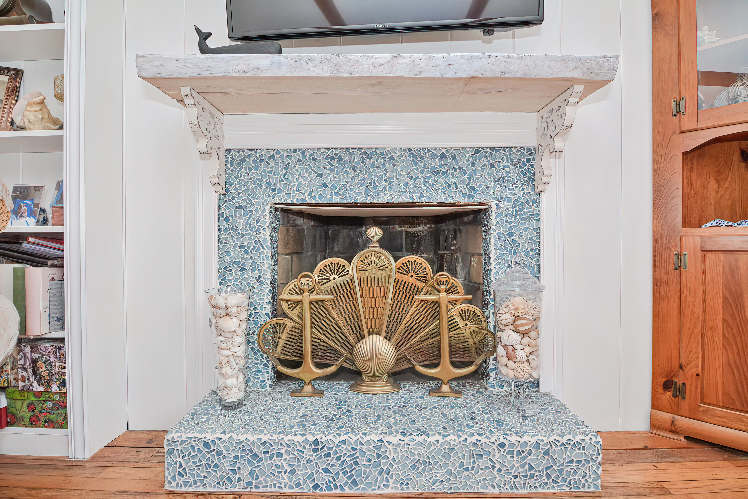 31 Susan Ruth Road Dennis Port, MA 02639 - Photo 9 of 27 a view of fireplace with wooden floor