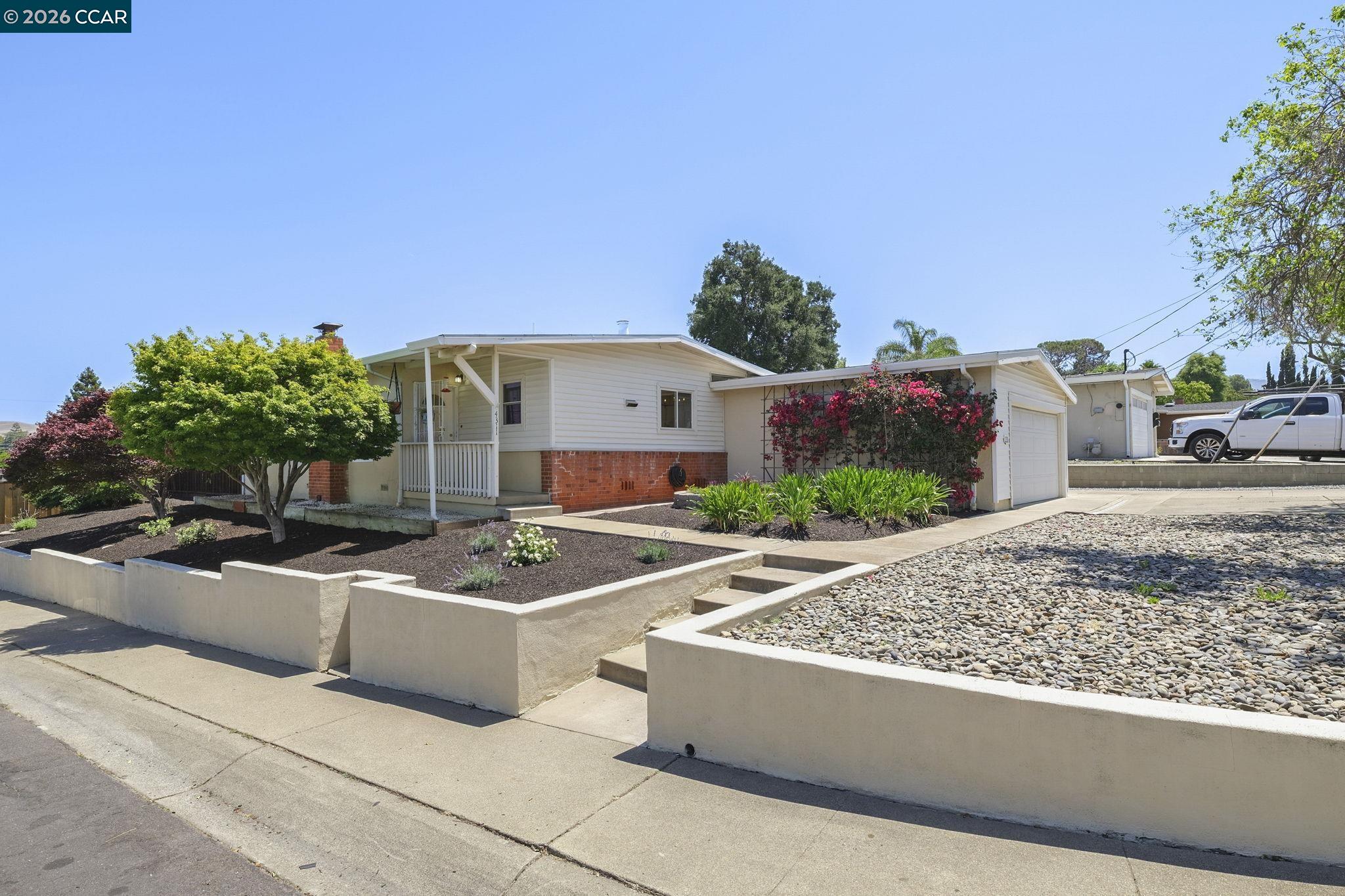 4311 Cowell Road Concord, CA 94521 - Photo 29 of 29 a view of a house with backyard and sitting area