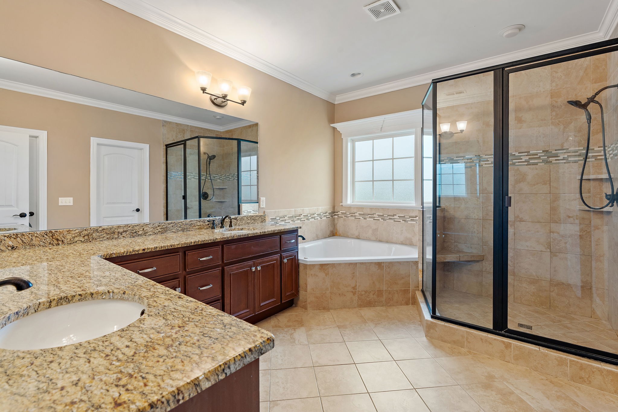 7670 Knobdate Road Smyrna, TN 37167 - Photo 14 of 29 a bathroom with a tub sink and mirror