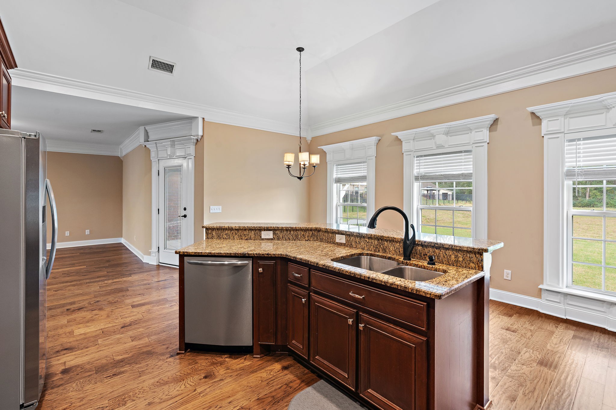 7670 Knobdate Road Smyrna, TN 37167 - Photo 10 of 29 a kitchen with granite countertop a sink cabinets and wooden floor