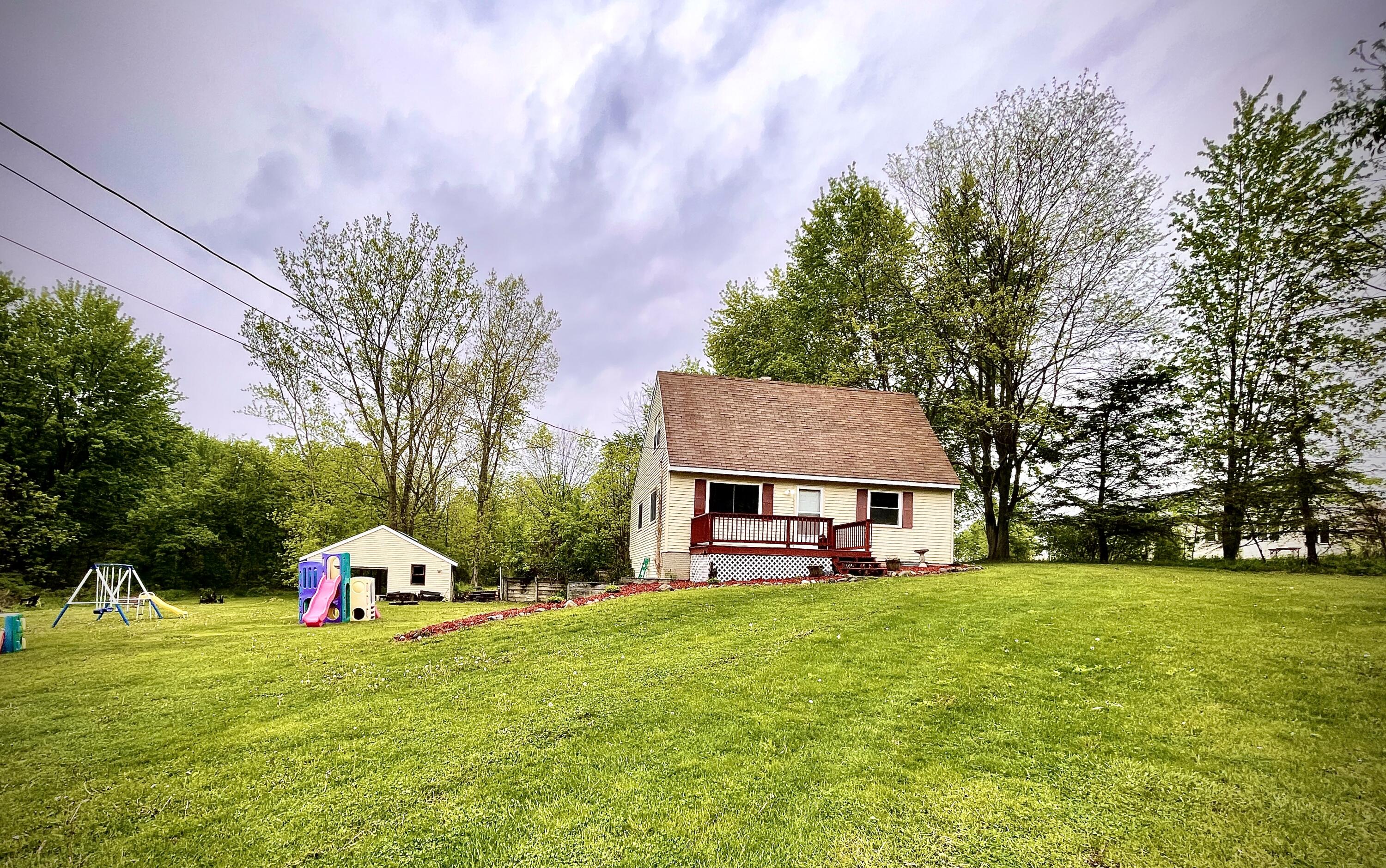 10376 Elm Road Clarksville, MI 48815 - Photo 1 of 17 35D67635-8FAD-4F3E-9521-8438B4AD3264_1_2