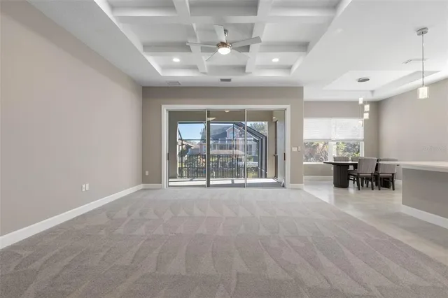 a kitchen with granite countertop a stove and a microwave