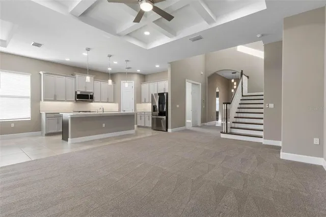 a living room with furniture and a couch