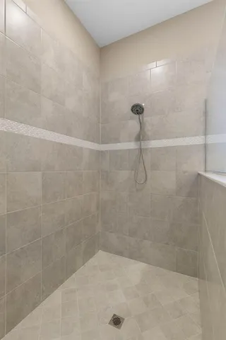 an aerial view of a house with outdoor space