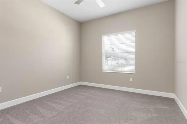 a aerial view of a house with swimming pool and porch