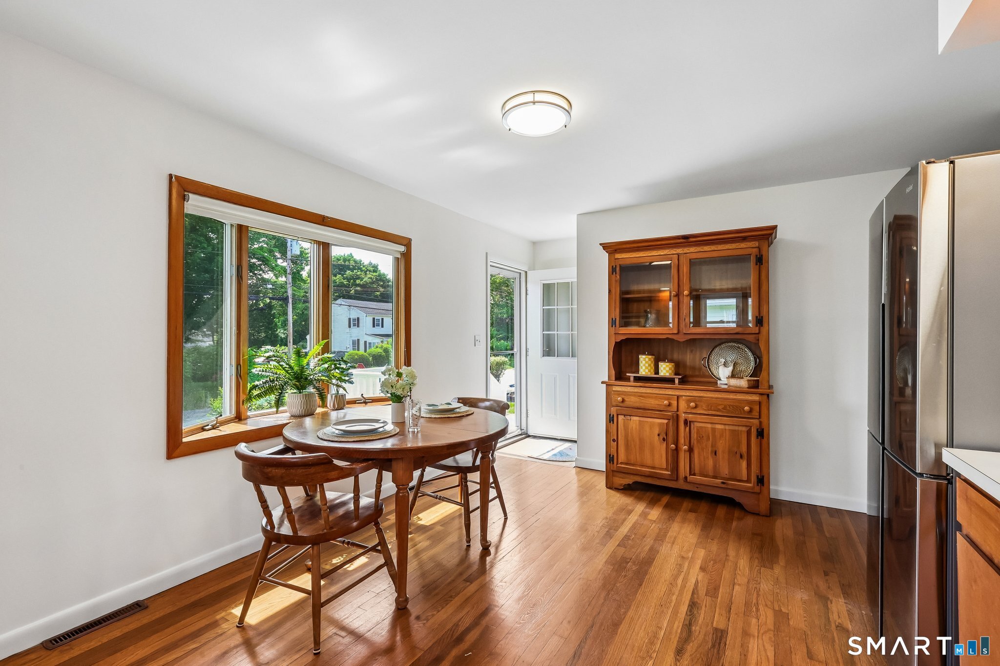 53 Chalker Beach Road Old Saybrook, CT 06475 - Photo 8 of 24 Sun filled kitchen with baywindow and recessed lighting.
