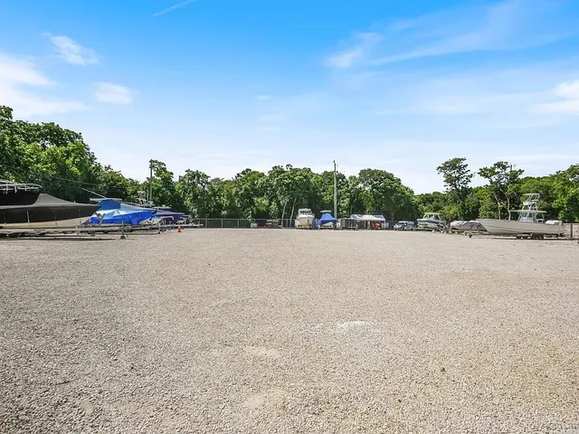 a view of a road with a yard