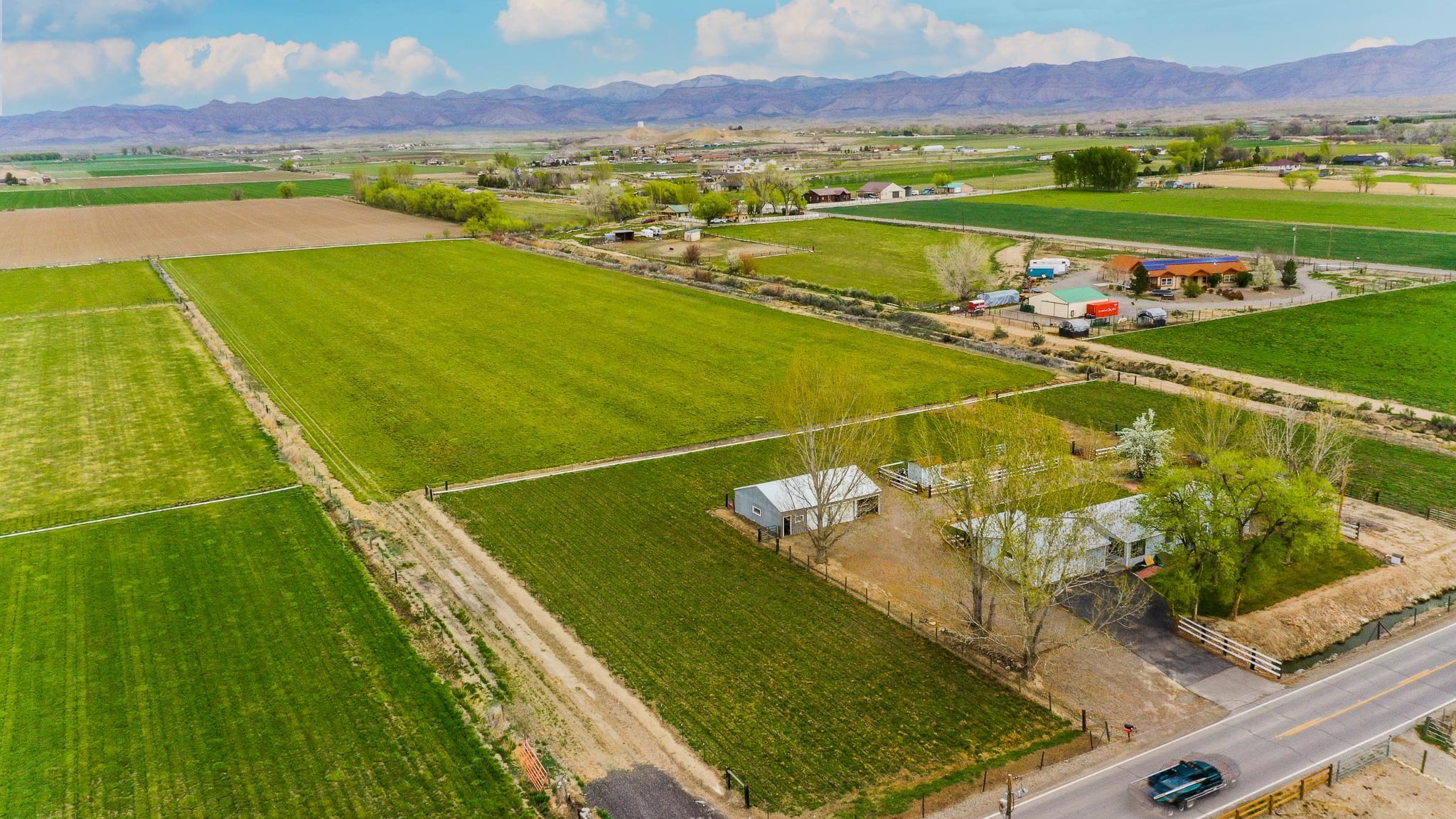 1786 North 3/10 Road Fruita, CO 81521 - Photo 3 of 11 a view of an outdoor space and a swimming pool