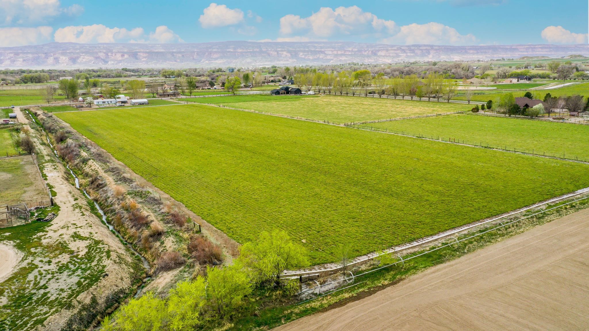 1786 North 3/10 Road Fruita, CO 81521 - Photo 8 of 11 a view of an ocean and a mountain