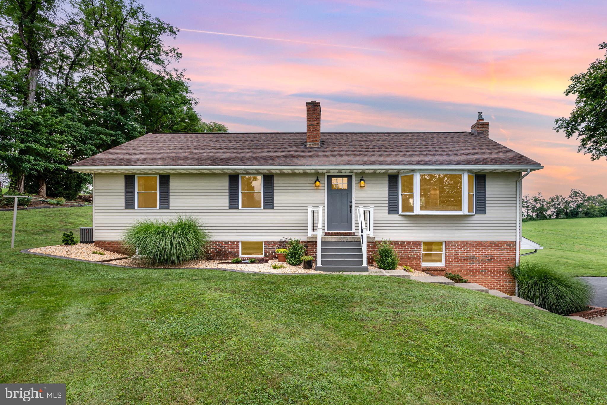 107 North Colebrook Road Manheim, PA 17545 - Photo 1 of 35 a front view of house with yard and green space