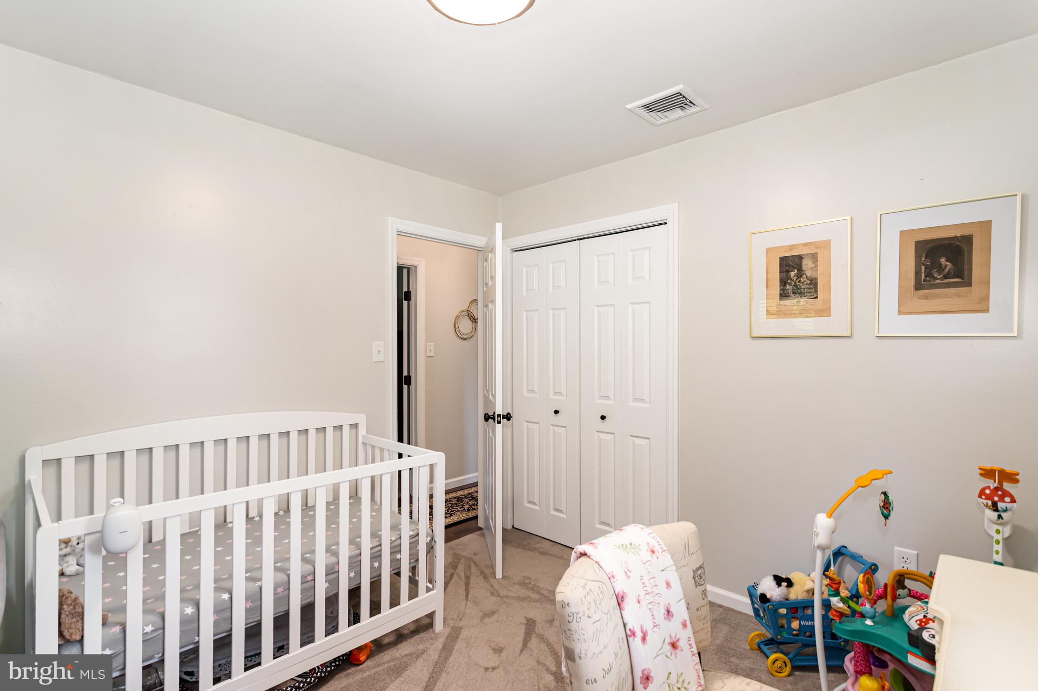 107 North Colebrook Road Manheim, PA 17545 - Photo 16 of 35 a bedroom with a bed and wooden floor