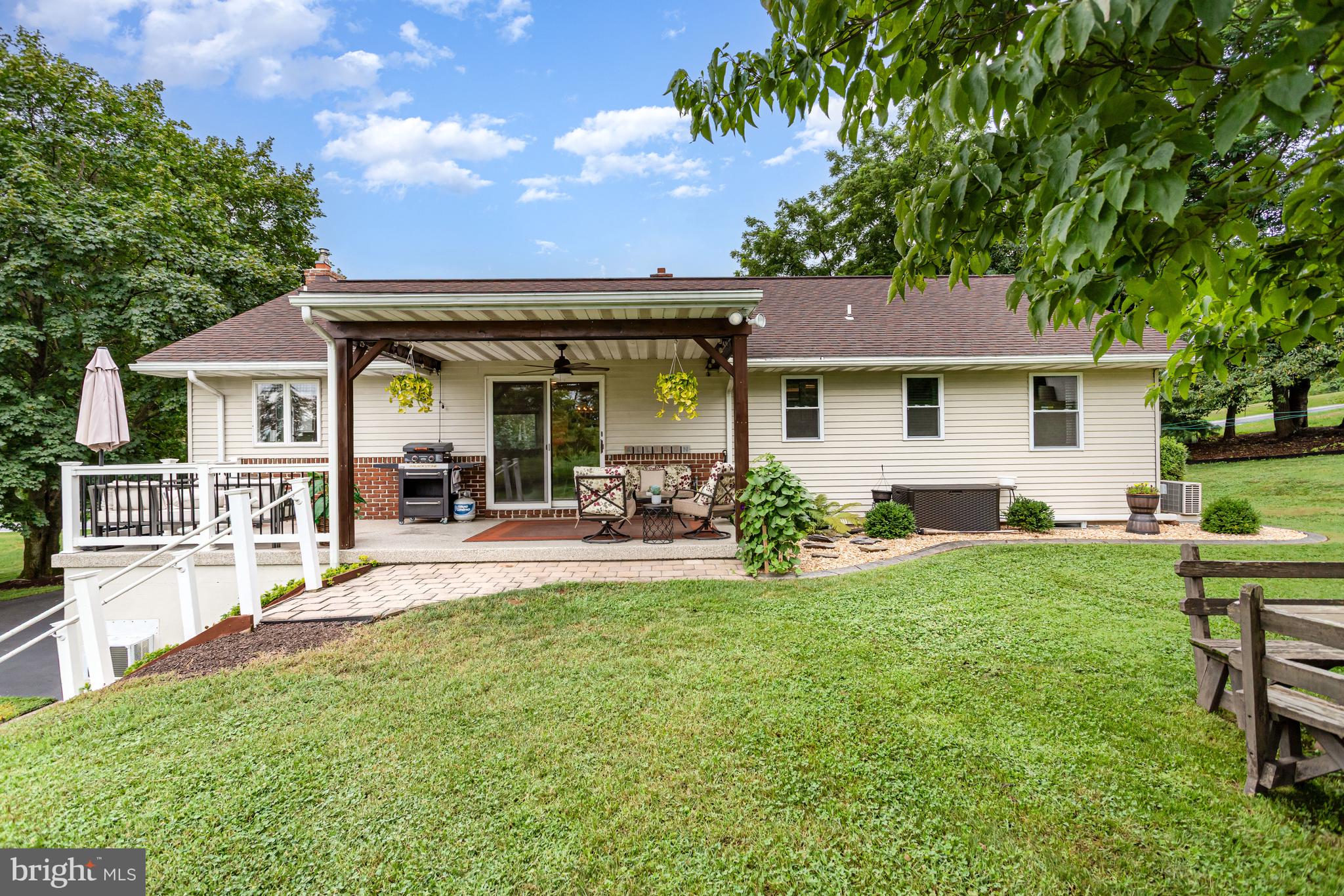 107 North Colebrook Road Manheim, PA 17545 - Photo 23 of 35 a view of house with backyard and sitting area