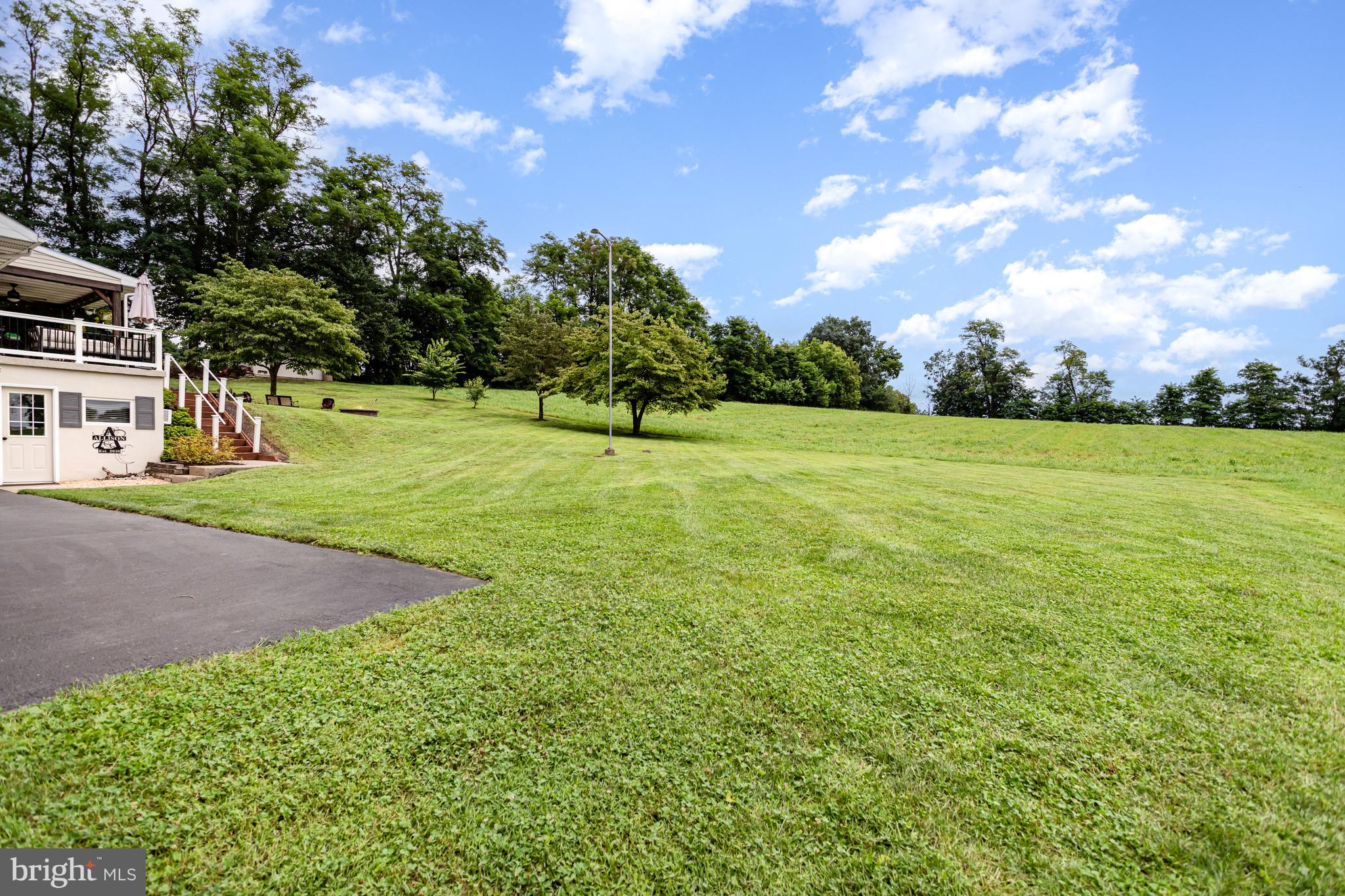 107 North Colebrook Road Manheim, PA 17545 - Photo 26 of 35 a view of a field with trees in the background