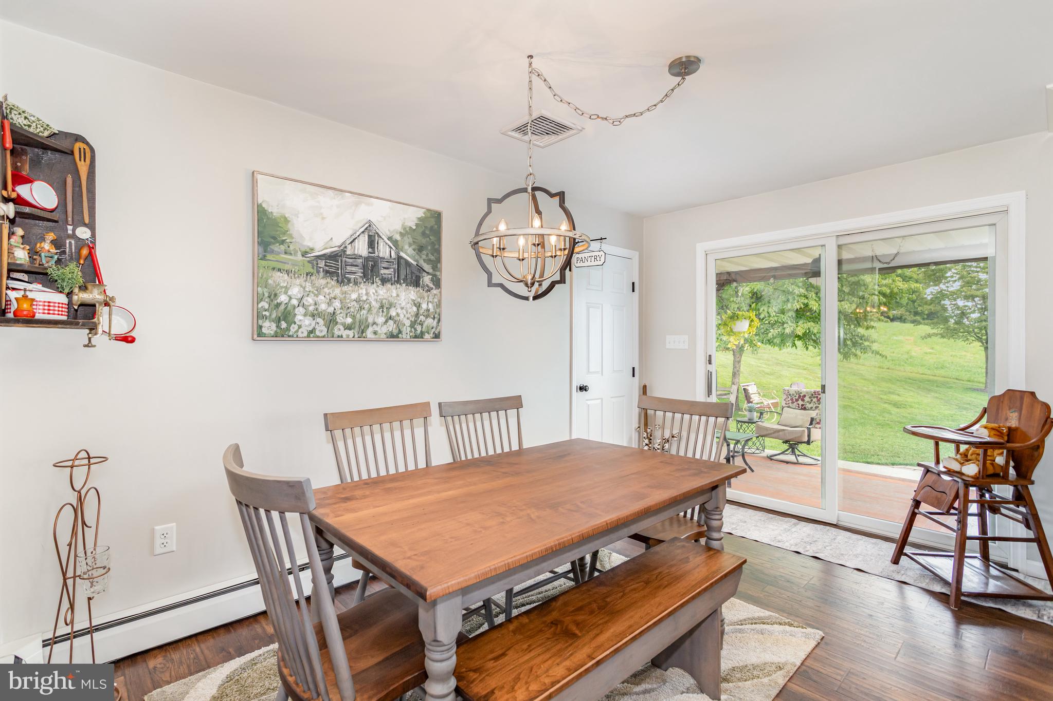 107 North Colebrook Road Manheim, PA 17545 - Photo 7 of 35 a view of a dining room with furniture window and wooden floor