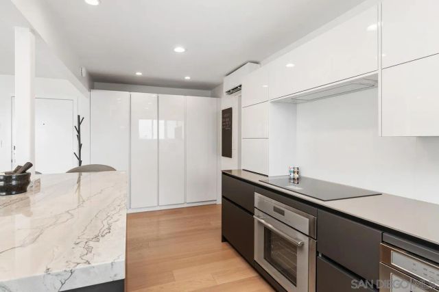 a kitchen with a sink and cabinets