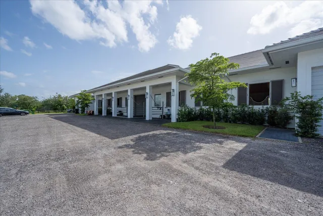 a view of a living room and entry way