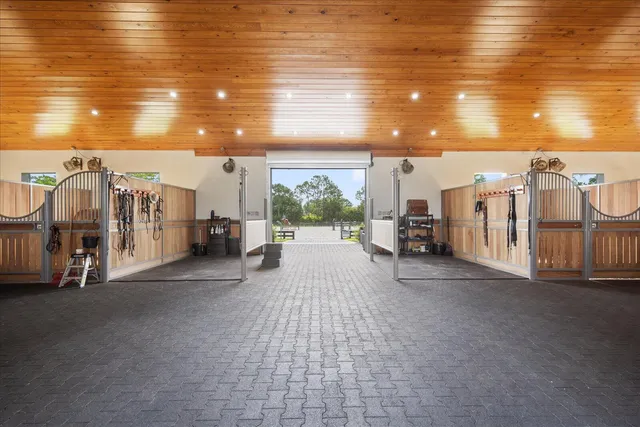 a view of a hallway with windows