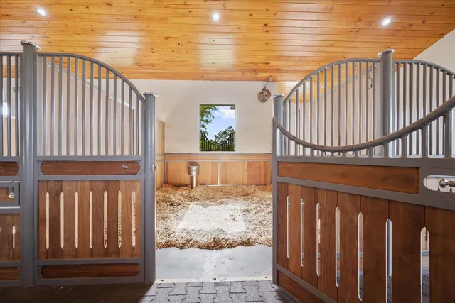 a view of a hallway with stairs