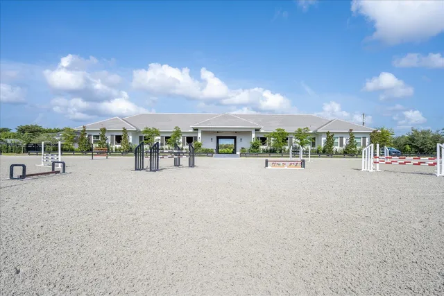 a view of a chair and table in the garden