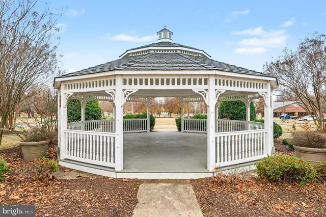 a street sign on a street next to a building