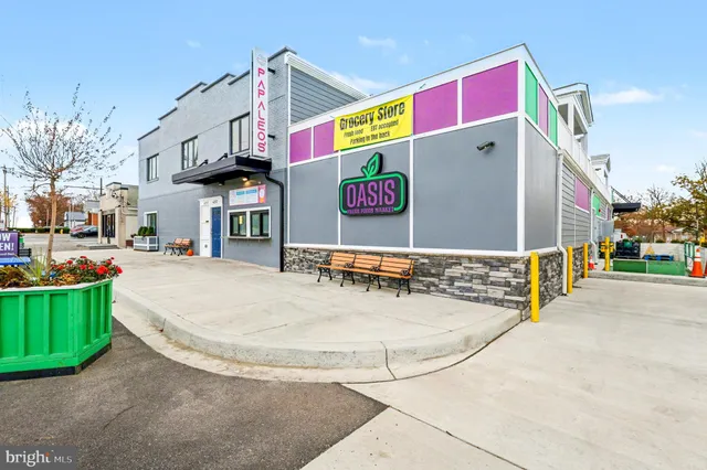 an aerial view of residential building with parking space