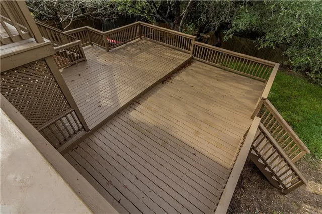 a view of outdoor space with deck and yard