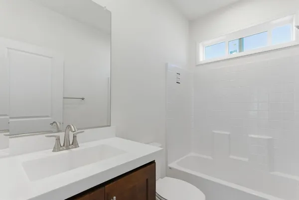 a bathroom with a sink and a bathtub