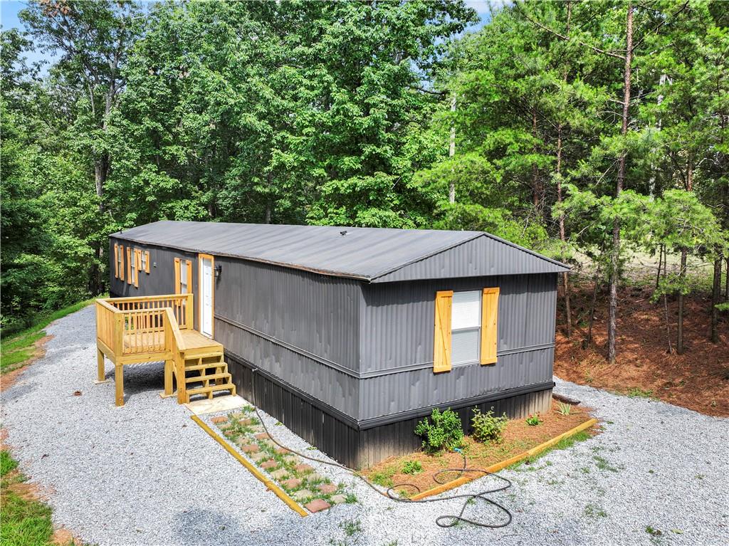 1458 Grant Mill Road Alto, GA 30510 - Photo 1 of 32 a backyard of a house with seating space