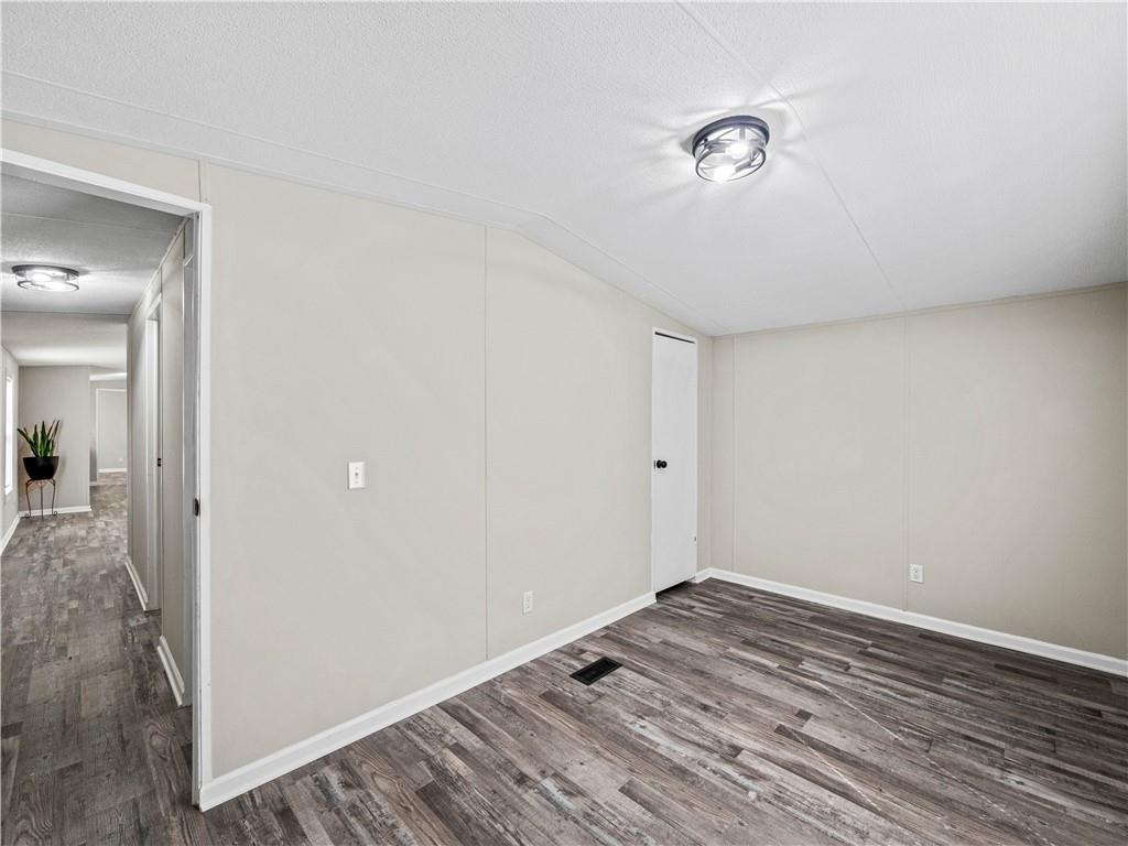 1458 Grant Mill Road Alto, GA 30510 - Photo 14 of 32 a view of a room with wooden floor